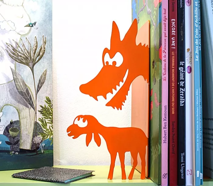 Original decorative and fun object to hold books on a shelf