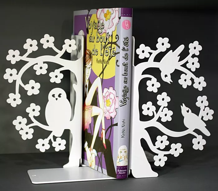 Fancy white metal bookends to decorate girl's room