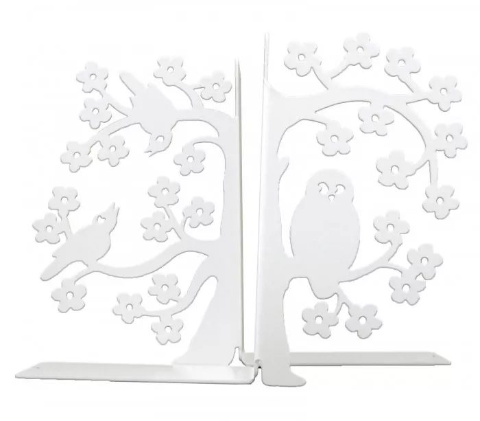 White decorative objects with birds an an owl