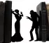 Laser-cut metal bookend with vampire and woman silhouette
