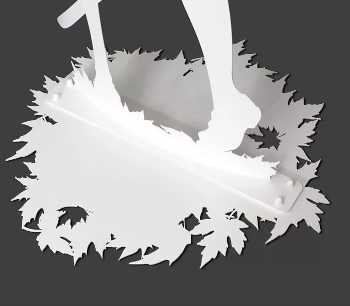 Base with laser-cut maple leaves created for the Kitsune sculpture